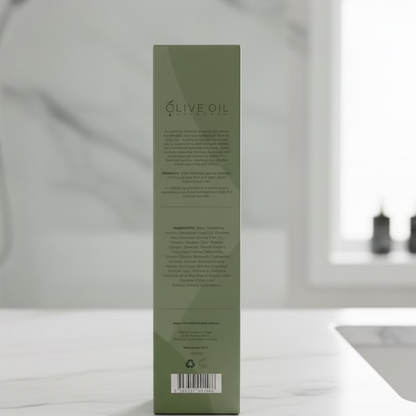 Olive oil packaging on a wooden surface with a blurred background